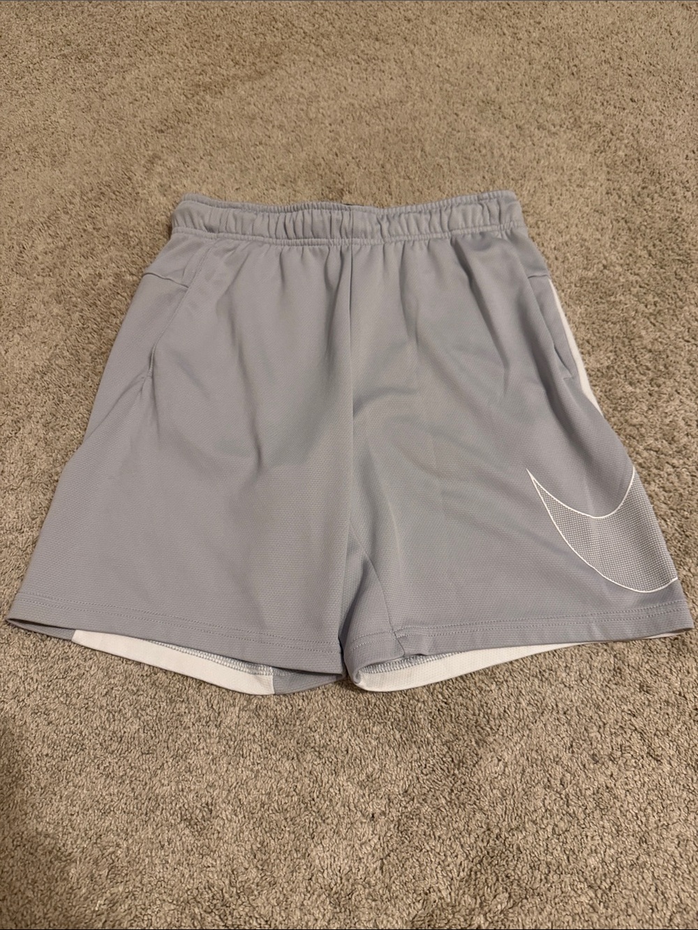 Nike Men's Light Gray Athletic Shorts with White Swoosh Accent